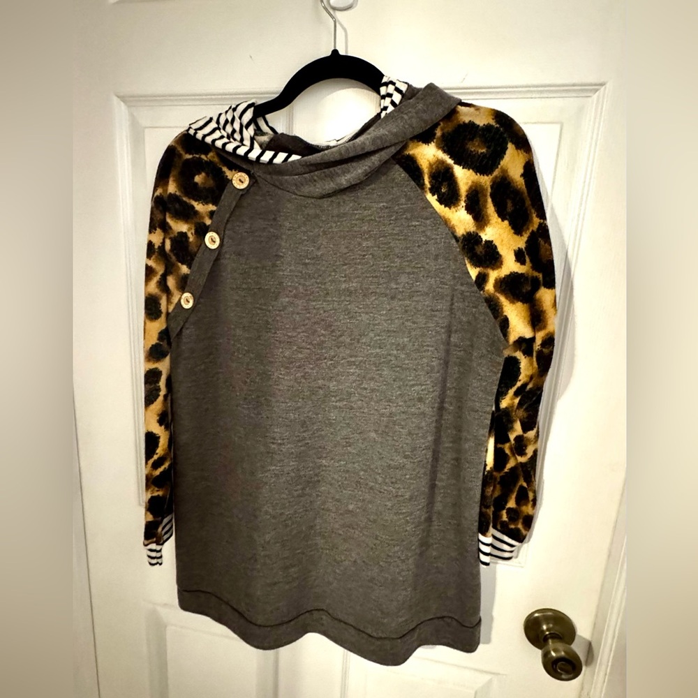 Size small thin long sleeve hoodie. Gray with leopard print and stripes too.
